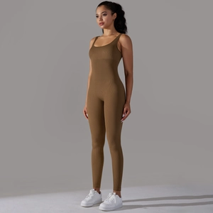 Detail view of coffee brown seamless ribbed yoga jumpsuit with slim fit and wide straps