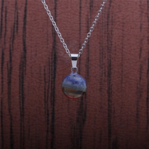 Close-up of a striped colorful stone pendant necklace with silver metal clasp
