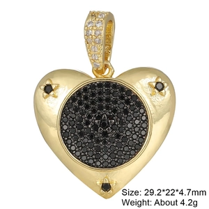 Macro view of a heart-shaped pendant with black pavé stones and crystal-encrusted bail