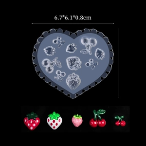 Detail of heart silicone nail mold with strawberry and cherry 3D resin fruit patterns