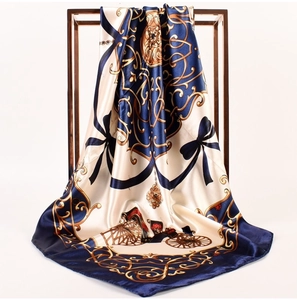 Detailed macro view of vintage horse carriage print on silky satin square scarf for women