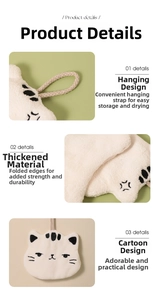 Close-up of white cat-shaped coral fleece hand towel showing thick texture and hanging loop