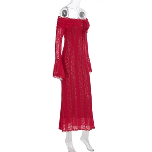 Detail of red off-shoulder lace dress showing flare cuffs and intricate floral patterns