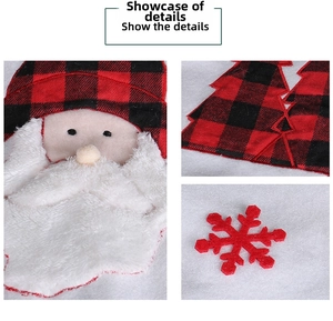 Detail of buffalo plaid christmas tree skirt with plush base and santa claus applique
