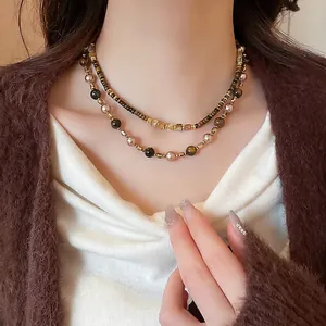 Vintage double-layer tiger eye and pearl necklace with warm brown autumn styling
