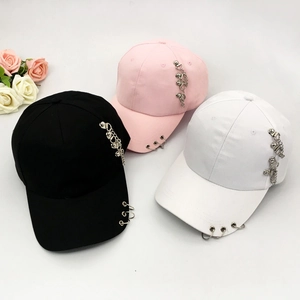 Fashion baseball caps in black, pink, and white with silver metal chain decor