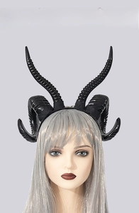 Detail of dual-style black ram horns and spiral demon horns on cosplay headband