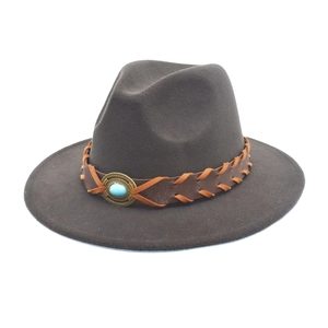 Detail of wool fedora hat with braided leather band and turquoise stone accent