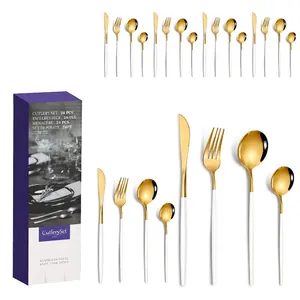 24-piece golden stainless steel cutlery set with white handles in elegant gift box