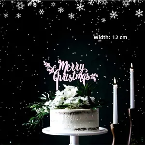 Pink Merry Christmas acrylic cake topper with 12cm width shown on a festive cake