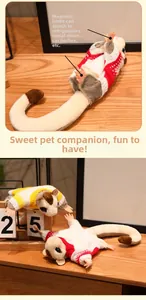 Detail of sugar glider plush with magnetic limbs and striped sweater on wooden surface