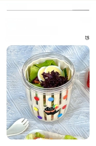 Close-up of dual-layer portable fruit cup with internal strainer and food-grade material