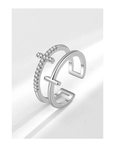 Detailed view of 925 sterling silver double-layer cross ring with pavé-set crystals
