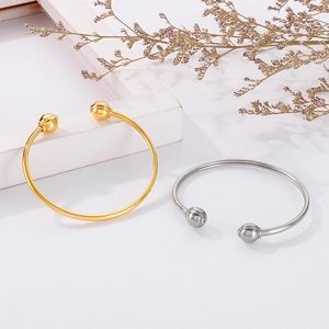 Minimalist stainless steel open ball cuff bracelet in polished gold and silver finish