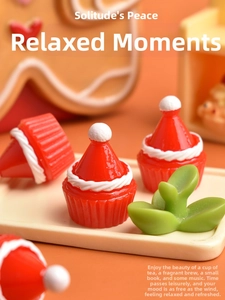 Macro shot of miniature Christmas hat cupcakes made of resin for holiday tabletop decor
