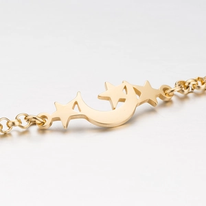 Golden star and moon charm bracelet with celestial pendants for women fashion style
