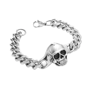 Silver stainless steel Cuban link bracelet with punk skull charm on a clean white background