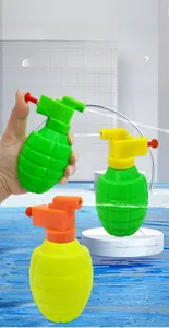 Close-up of grenade-shaped water guns with manual press trigger for summer pool fun