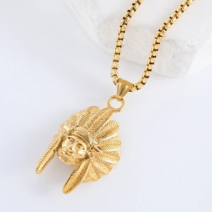 Close-up of a gold-plated stainless steel necklace with a detailed Native American chief pendant