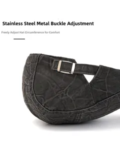 Detail of black cotton ivy cap featuring an adjustable silver stainless steel buckle