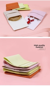 Detail of microfiber envelope jewelry pouches in pastel colors for necklaces and bracelets