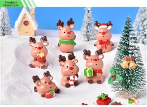 Detailed view of six miniature Christmas reindeer figurines with festive accessories
