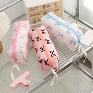 Quilted bow pencil case set in pink and white with diamond patterns for students