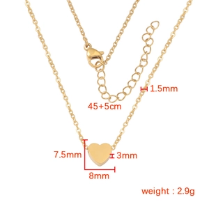 Gold stainless steel heart pendant necklace with dimensions and weight detail