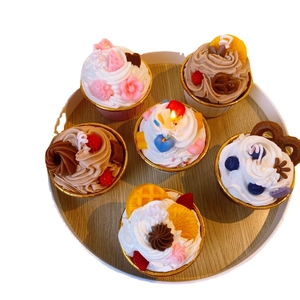 Set of 6 realistic cupcake scented soy candles with cream and fruit toppings