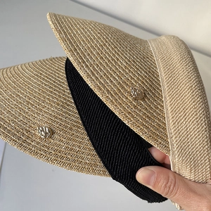 Women's minimalist woven straw sun visor with elegant rose metal buckle detail