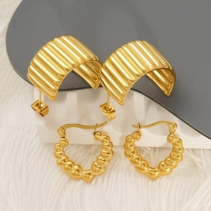 Two pairs of gold stainless steel hoop earrings with vertical stripes and beaded textures