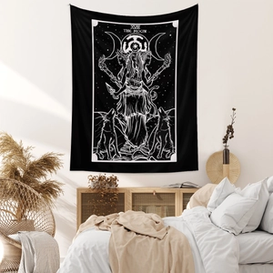 Detail of The Moon tarot tapestry with mystical goddess and wolf on bedroom wall
