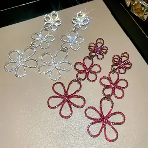 Elegant floral drop earrings with hollow petals and crystals in silver and red sets
