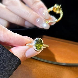 18k gold plated ring featuring oval olive green zircon and pavé crystal accents