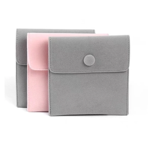 Bolsas de ante para joyas en gris y rosa con cierre de presión para guardar anillos