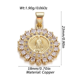Detailed size view of a gold-plated copper pendant with religious relief and crystals