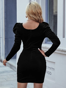Elegant back view of slim velvet dress with square neck and puff sleeves detail