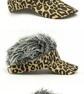 Detailed side view of leopard print visor cap featuring long grey faux hair wig top decoration