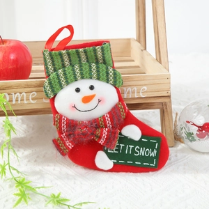 Detailed plush snowman Christmas stocking with festive red and green knitted scarf and hat