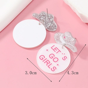 Detail view of acrylic cowboy hat earrings with Let's Go Girls text and 4.3cm size scale