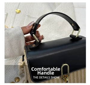 Detailed close-up of woven straw handbag with black leather flap and gold metal hardware