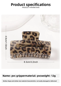 Detailed view of leopard print PVC hair claw clip with size dimensions 8.3cm by 4.8cm