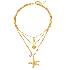 Three-layer gold starfish and pearl shell necklace with nautical pendants on white background