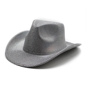 Detail of western cowboy hat featuring black and white stripes with a metallic silver finish