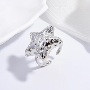 Vintage textured starfish silver open ring with unique hammered metal design for women