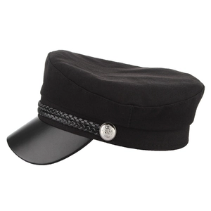 Detail of black military cap featuring braided rope and silver embossed side button