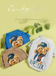 Detailed flat lay of three cotton pet hoodies in blue, brown and grey with bear print