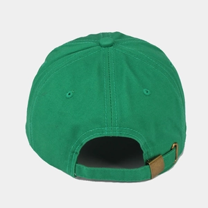 Detail of adjustable cotton baseball cap back with bronze metal buckle in green