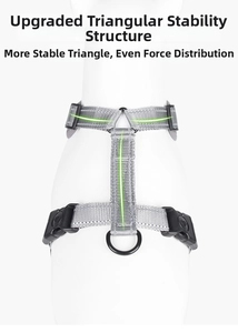 Detailed view of grey reflective dog harness with triangular stable structure and metal ring