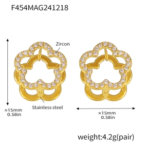 Detailed view of gold flower earrings with zircon insets and measurement markers